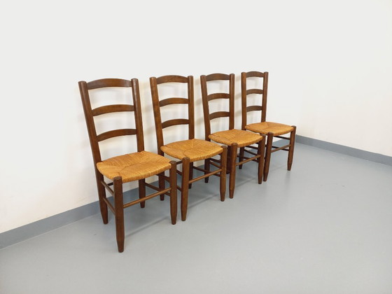 Image 1 of Set van 4 vintage brutalistische stoelen van hout en stro uit de jaren 60.