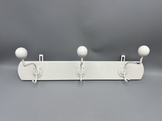 Image 1 of Mid - Century coat rack sleek and timeless design