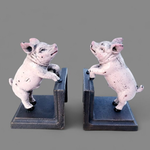 Ensemble de serre-livres en fonte en forme de cochon
