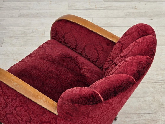 Image 1 of Anni '60, poltrona danese in velluto rosso ciliegia.