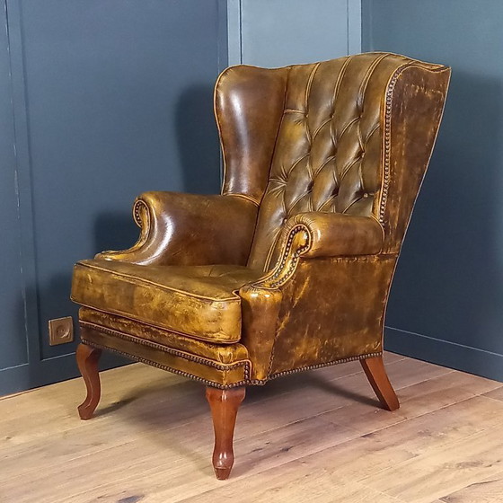 Image 1 of Cognac kleurige Vintage chesterfield fauteuil. 1 van 2