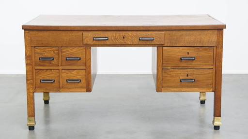 Antique oak Art Deco desk from early 20th century in Amsterdam school style