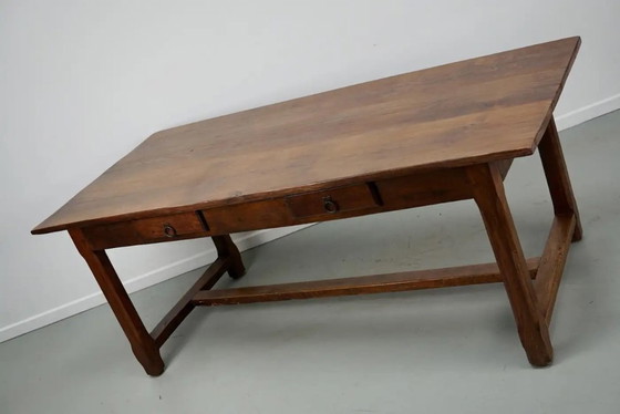 Image 1 of Early 20th-century French rustic country dining table made of oak and elm
