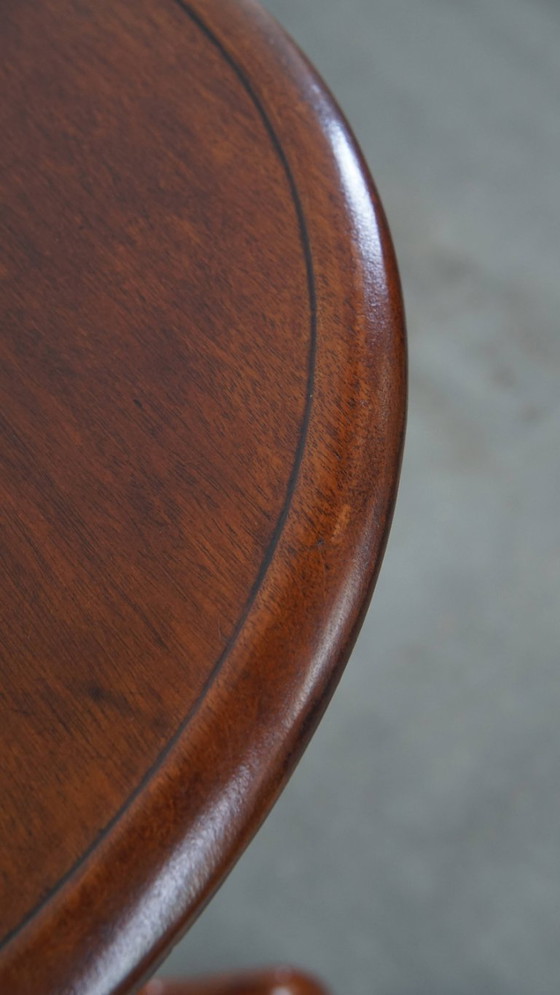Image 1 of Antique English side/ wine table from the late 19th century with a single piece top