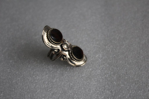 Large boho statement ring, handmade from alpaca silver with 2 small brown round semi-precious stones. Adjustable size.