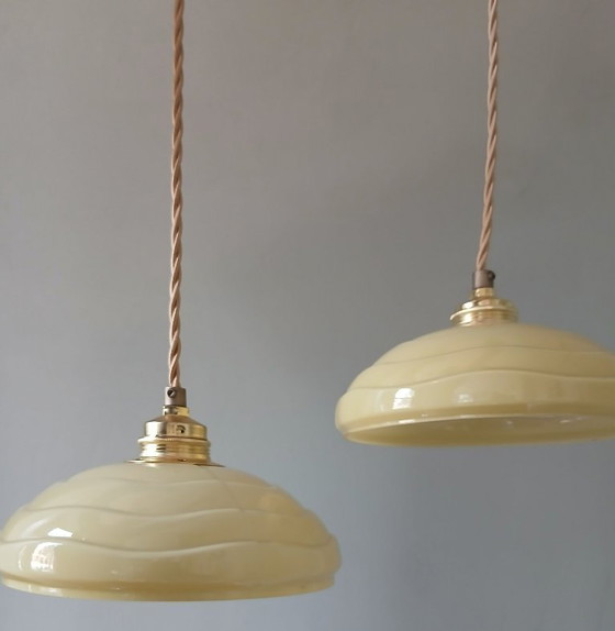 Image 1 of Set (2) Antique ceiling lamps in pastel brown/yellow color.