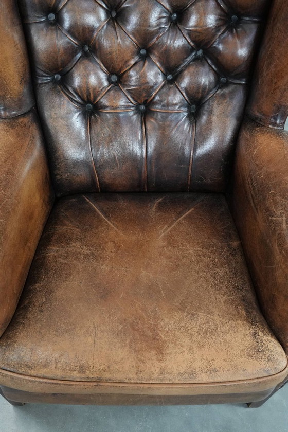 Image 1 of Unique large English-style sheepskin Chesterfield wing armchair