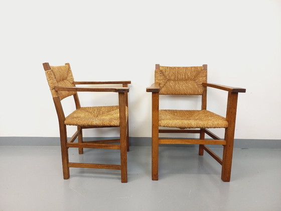 Image 1 of Suite van 2 vintage Brutalistische fauteuils in eiken en stro uit de jaren 60