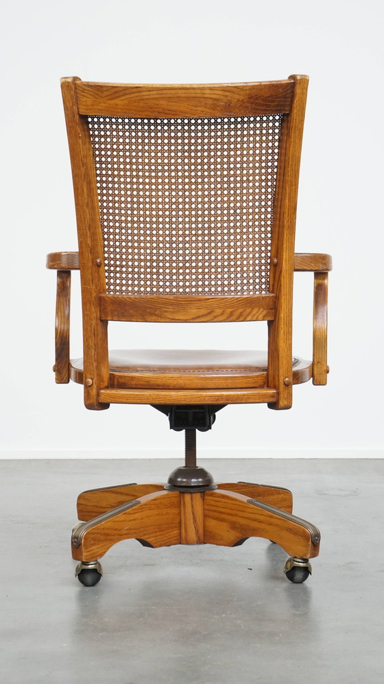Image 1 of Cognac Colored Leather Office Chair on Wheels with Wood and a Wicker Matted Backrest
