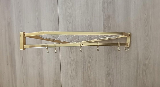 Image 1 of Fifties corner string coat rack