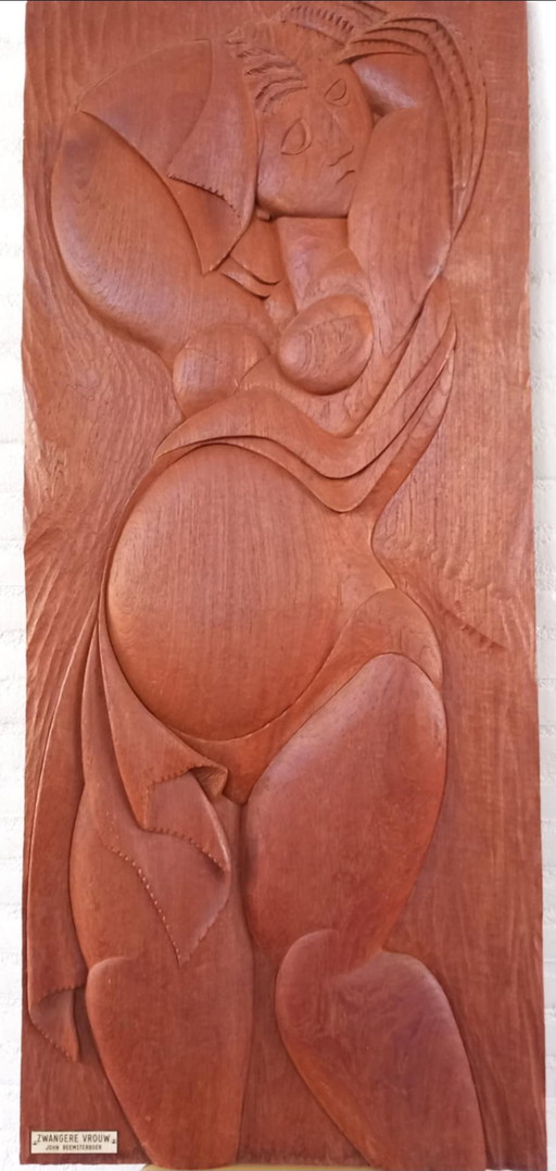 Tallado único en madera de teca por el artista John Beemsterboer.