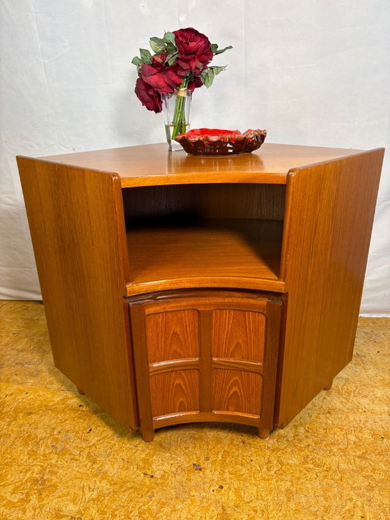 Image 1 of Vintage Nathan Teak Corner Cabinet (c. 1960s–1970s) – Mid-Century Modern  A beautiful and highly practical vintage teak corner c