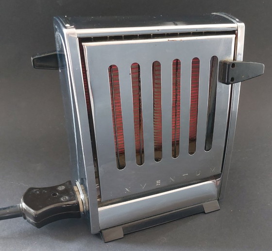 Image 1 of Two Inventum vintage chrome toasters