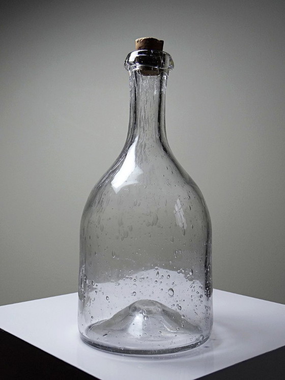 Image 1 of Large antique bottle in blown glass with bubbles, early 20th century, 1900-1920
