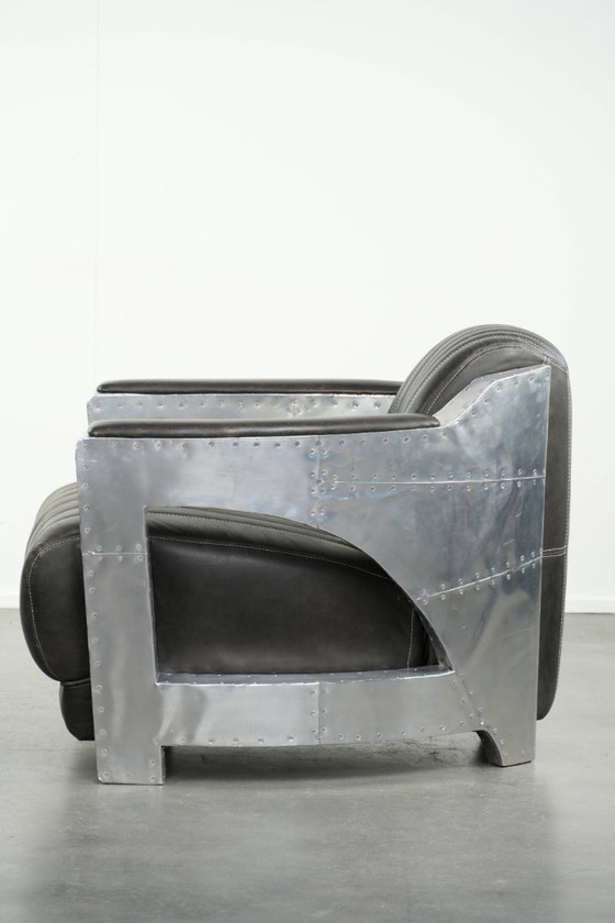Image 1 of Fauteuil/robinet de style aviateur unique et confortable en cuir de vachette, finitions aluminium et rivets