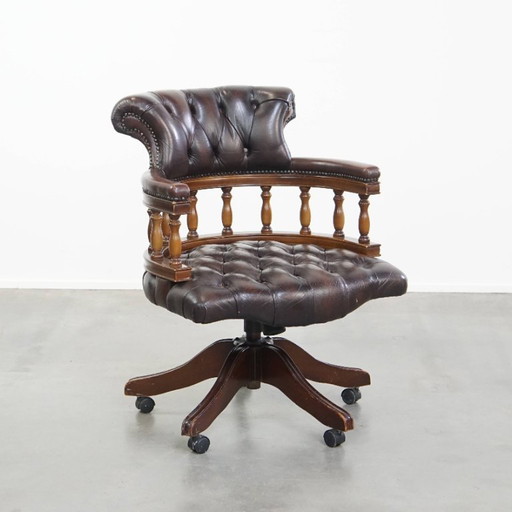 Chesterfield office chair on wheels, swivel and tilt in a dark brown color