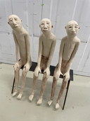 3 men on a bench - ceramic artwork