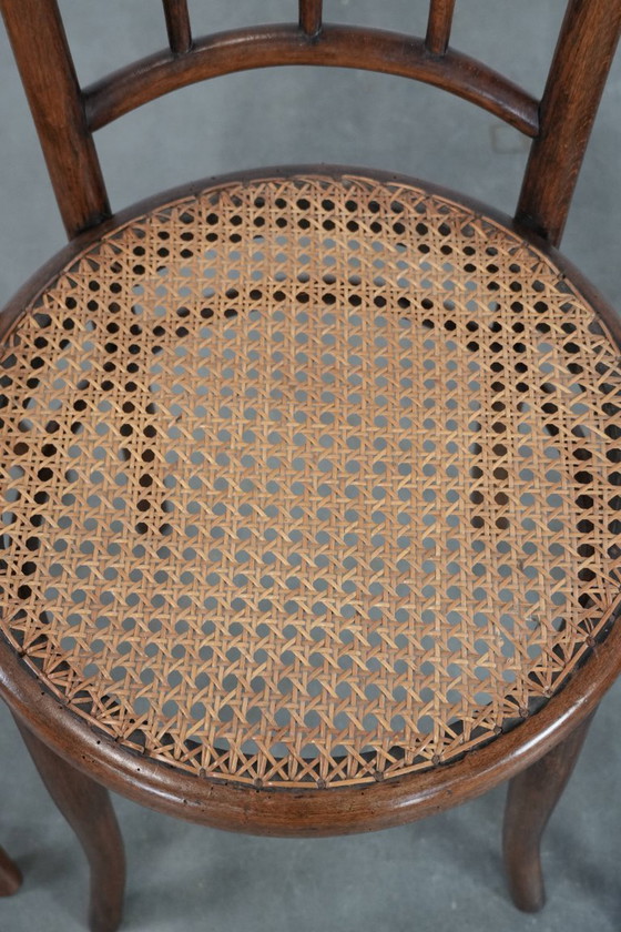 Image 1 of 4 x Wooden vintage bistro chair Jacob & Josef Kohn Wien with a wicker seat