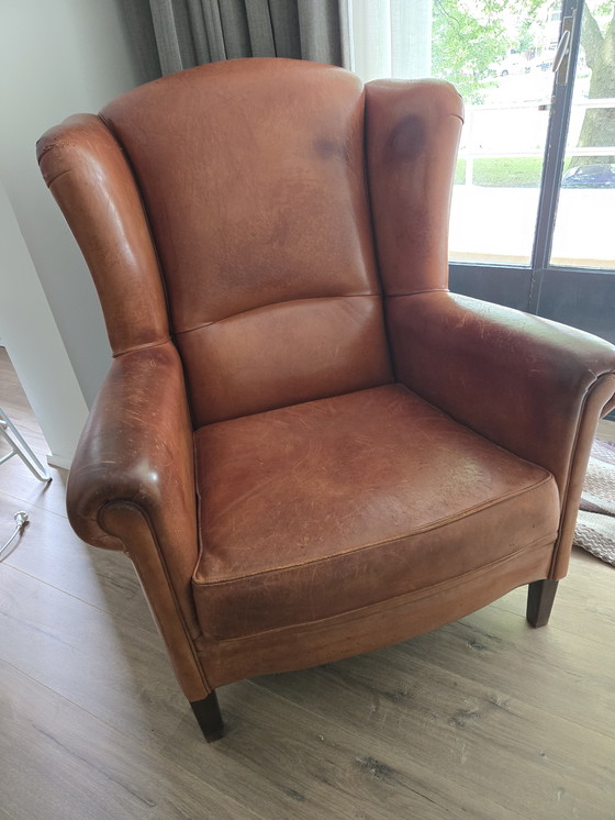 Image 1 of Poltrona con orecchie in pelle