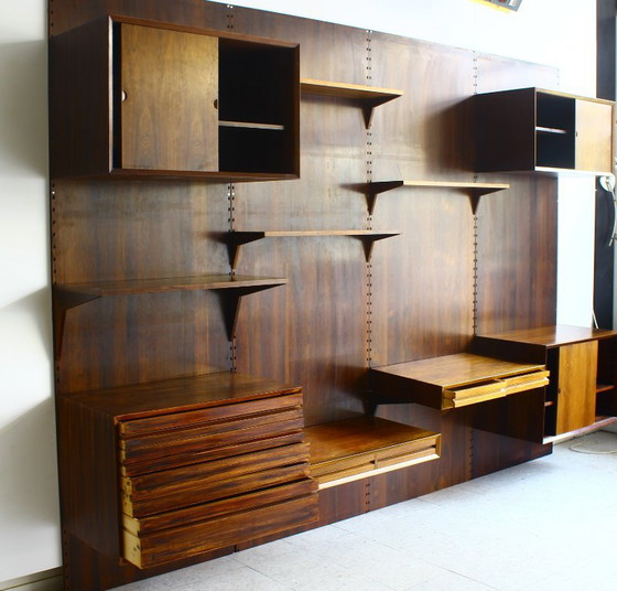 Mueble de pared en palisandro, de Poul Cadovius para Cado, Dinamarca. – Estanterías de pared, Wood (photo 15 of 17)