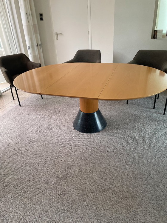 Image 1 of Oval Arco table with granite base