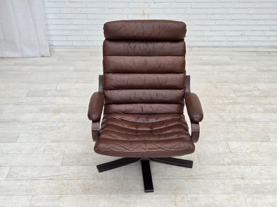 Image 1 of Anni '70, poltrona girevole danese di Georg Thams, in pelle marrone.