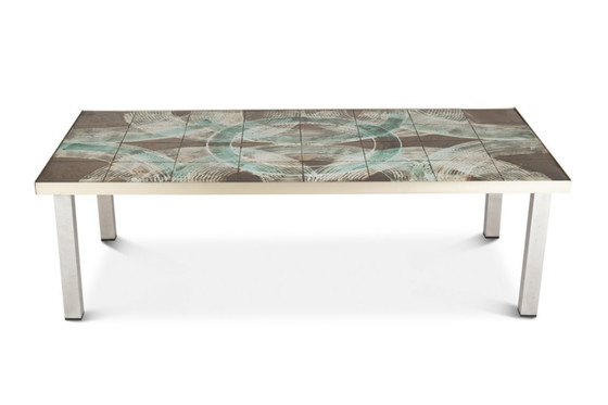 Image 1 of Coffee table with ceramic and chrome-plated top. Circa 1970.