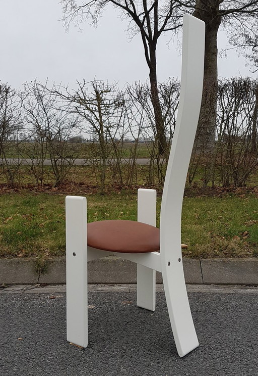 Golem dining chair designed by Vico Magistetti for Poggi