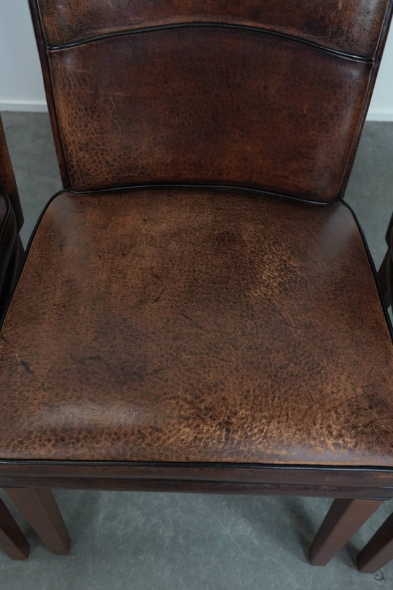 Image 1 of 4 chaises de salle à manger confortables en peau de mouton avec du caractère