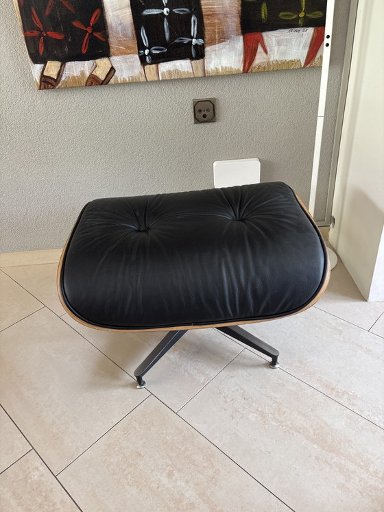 Image 1 of 2 x leather Eames armchairs with ottoman (replica)