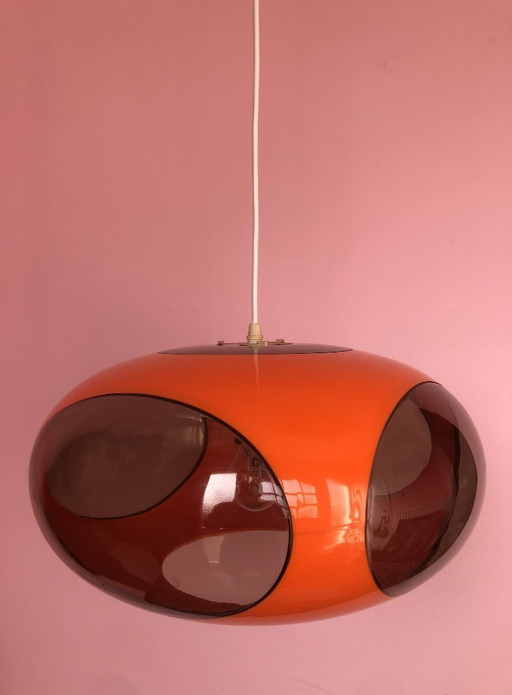 Lampada arancione "occhio di insetto" in stile era spaziale.