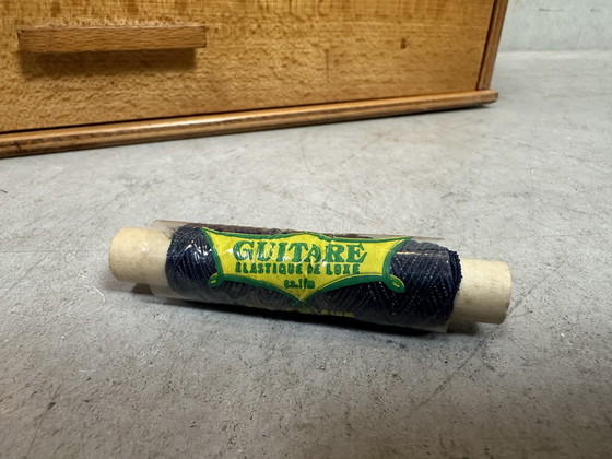 Image 1 of Vintage display case/counter - 'Guitare' Elastique de Luxe