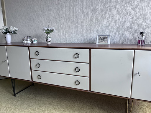 Tall sideboard with teak and brass by William Watting