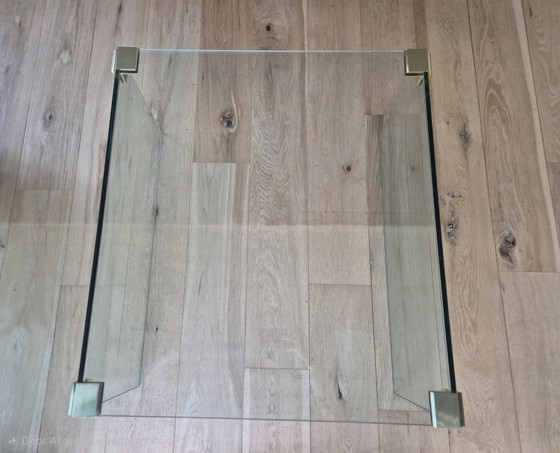 Glass coffee table with brass-colored details. – Side tables (photo 5 of 5)