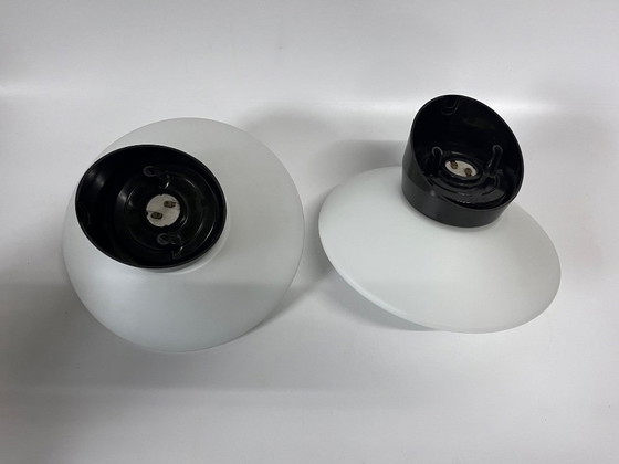 Image 1 of 2x RAAK discus Mid Century wandlamp wit opaalglas bakelieten armatuur model B1410