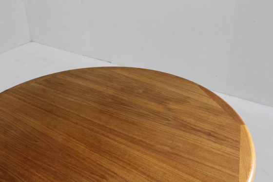 Image 1 of Vintage Danish round extendable teak dining table from the 1960s