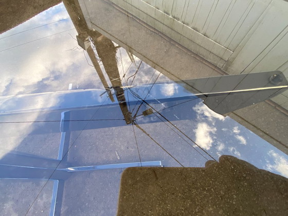 Image 1 of Round smoked glass and chrome table by Florence Knoll and Roche Bobois, 1970s