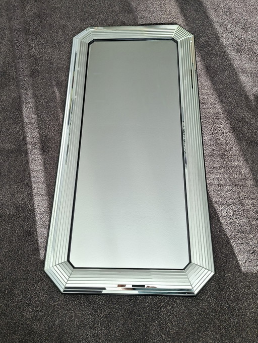 DeKnudt spiegel, Eric Kuster stijl