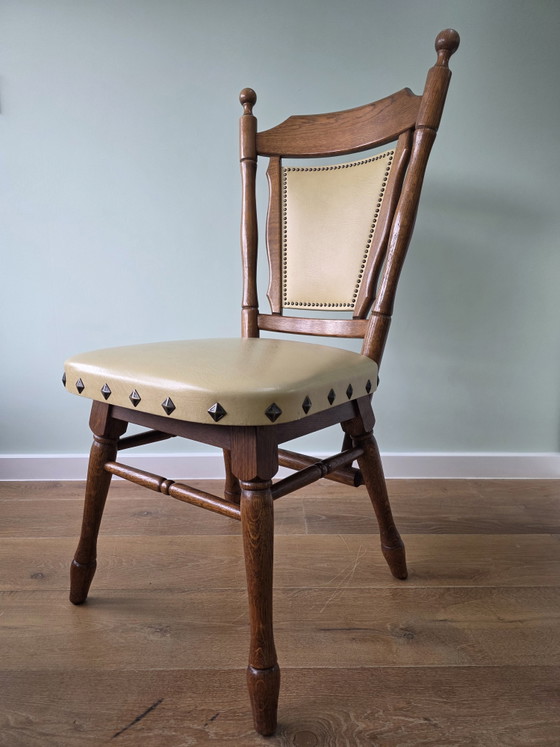 Image 1 of Set of 2 solid oak chairs with decorative nails