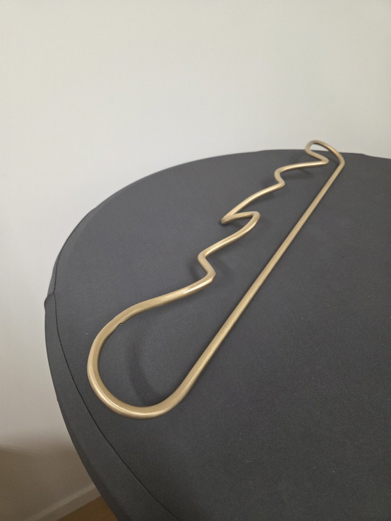 Image 1 of Curvature Towel Hanger (brass) by Ferm Living (new)