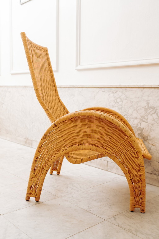 Large Rattan Armchair With Crescent Legs