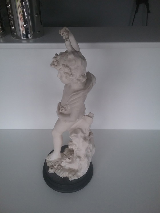 Image 1 of Jongen met bloemen 
