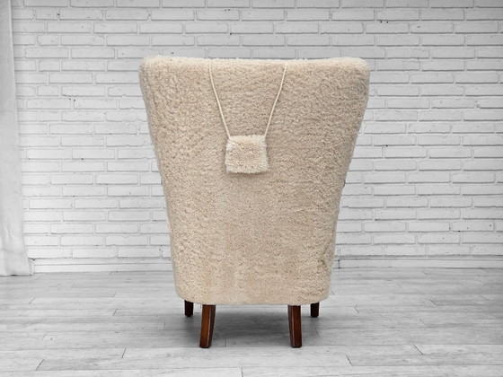 Image 1 of Jaren 60, Deens ontwerp van A. Christensen voor Slagelse Møbelværk, schapenvacht.