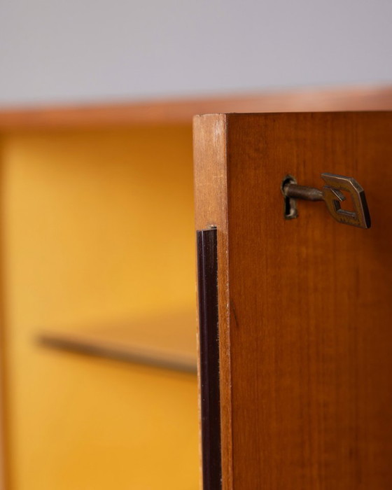 Image 1 of Vintage teakhouten dressoir uit de jaren 60 met wandmontagesysteem, Italiaans design.