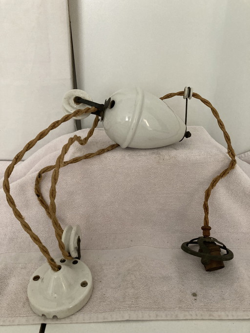 Mecanismo de elevación y descenso de porcelana vintage de la década de 1950.