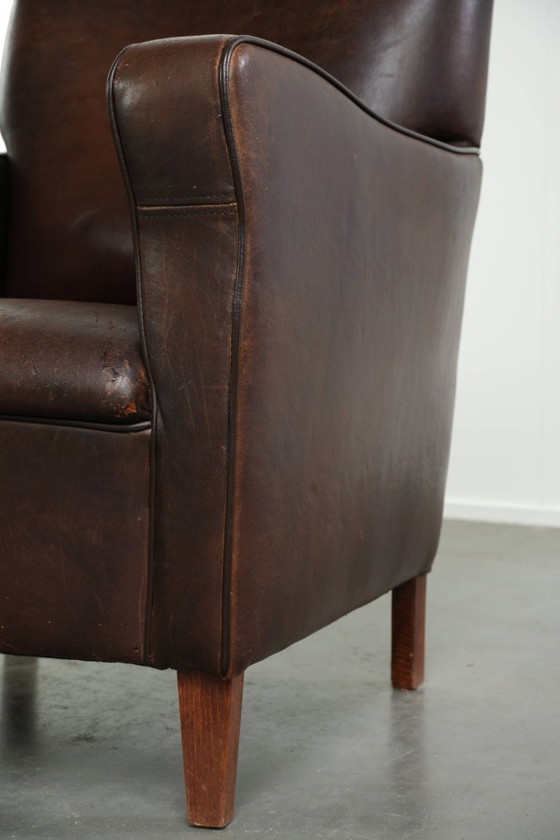 Fauteuil Subtil Foncé Vintage En Cuir De Mouton Avec Coussin Fixe Et Design Intemporel – Leather, Klassiek (photo 12 of 12)