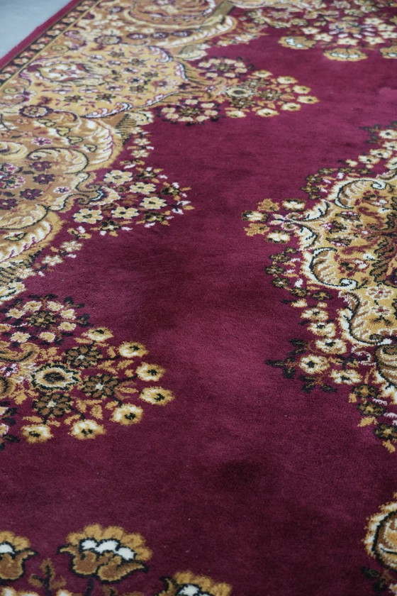 Image 1 of Grande tappeto con bellissimi motivi prevalentemente nei toni del rosso e del giallo 295x200cm