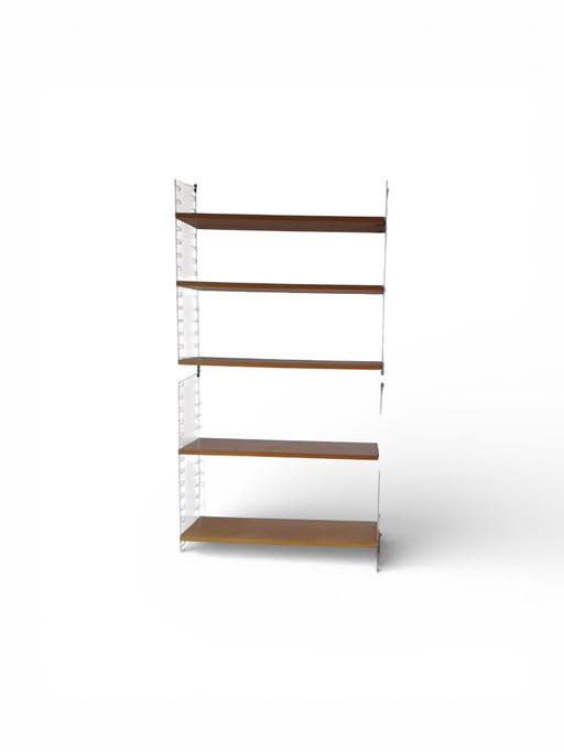 Nisse String wall system including sectary cupboard