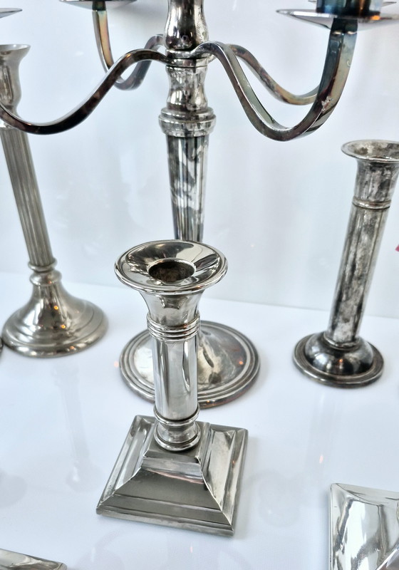 Image 1 of Collezione di 11 candelieri vintage placcati in argento (ottone) di varie epoche