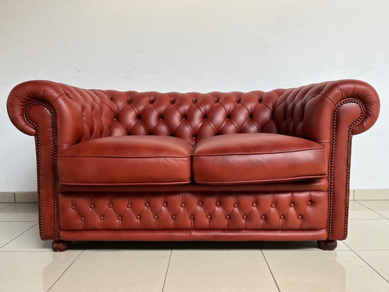Image 1 of English Chesterfield Sofa Pair – Paprika Red Leather (Fully Restored, Rare Colour)